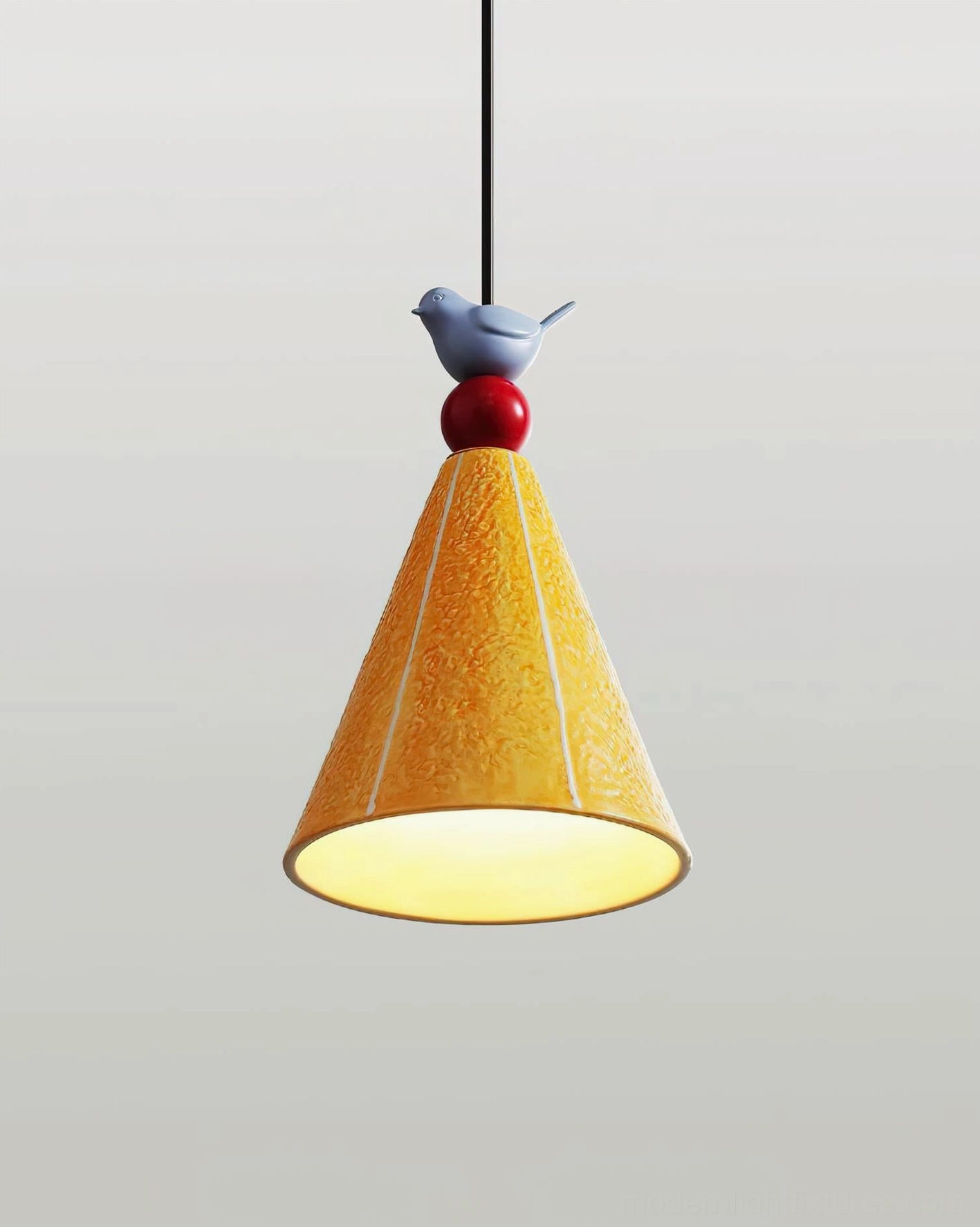 Brightly illuminated ceramic pendant lamp with bird finial, full warm light output, studio photography against gray background