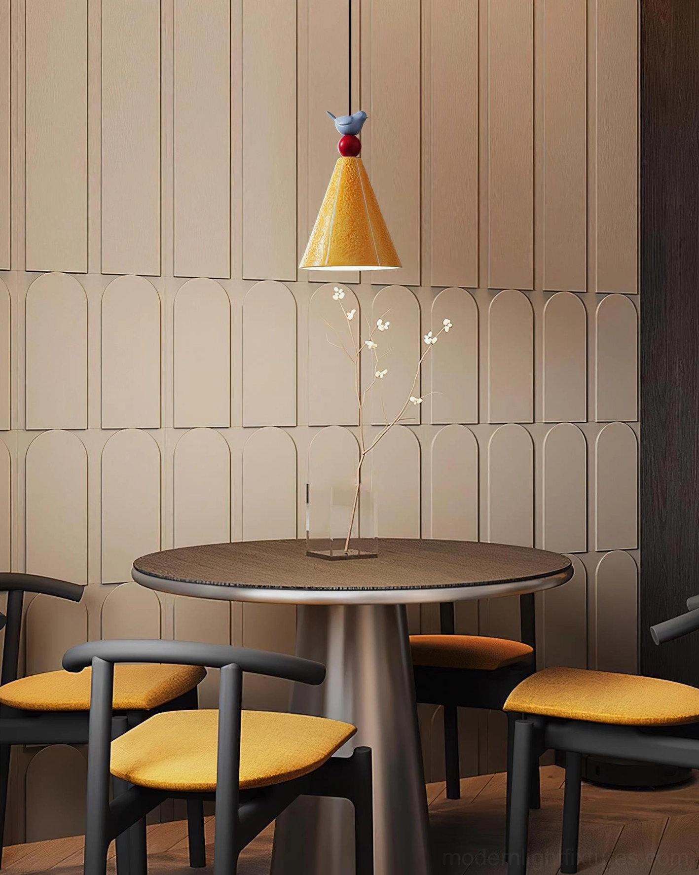 Tweetie pendant lamp installed in modern dining room above round table, warm residential interior setting with minimalist decor