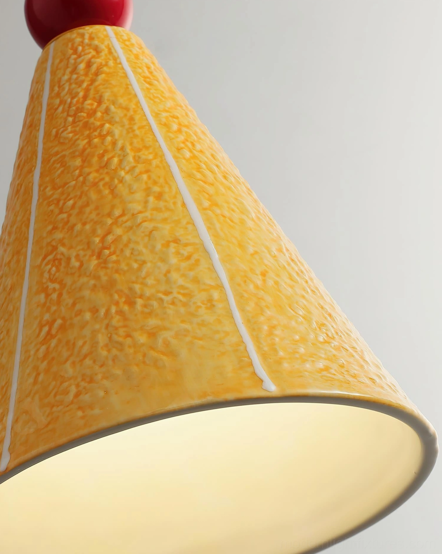 Playful ceramic pendant lamp with whimsical bird ornament on glossy sphere, contemporary Nordic modern design fixture