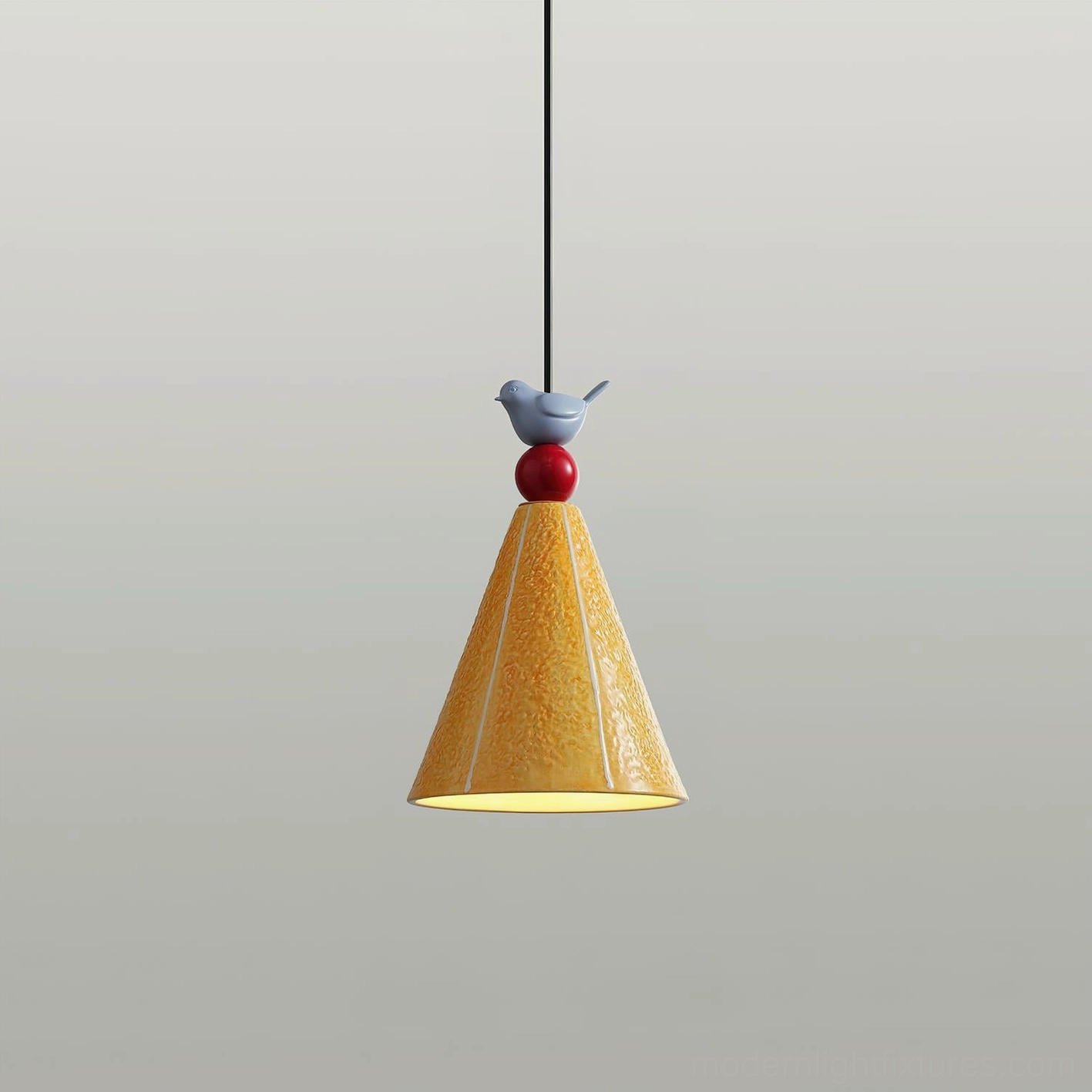 Red sphere and yellow ceramic cone pendant lamp with blue bird perch, side perspective view unlit studio photography
