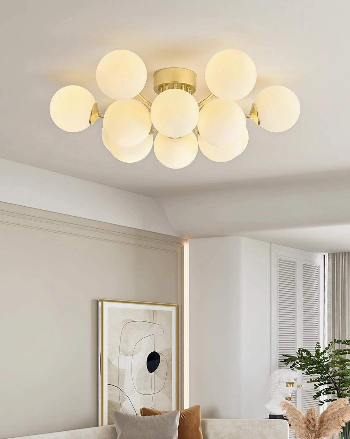 12-head large multi-ball sputnik ceiling light with extended brass gold arms and frosted glass shades