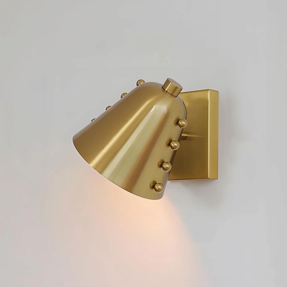 Pair of gold Twilight pin wall sconces providing warm ambient lighting in mid-century modern living room