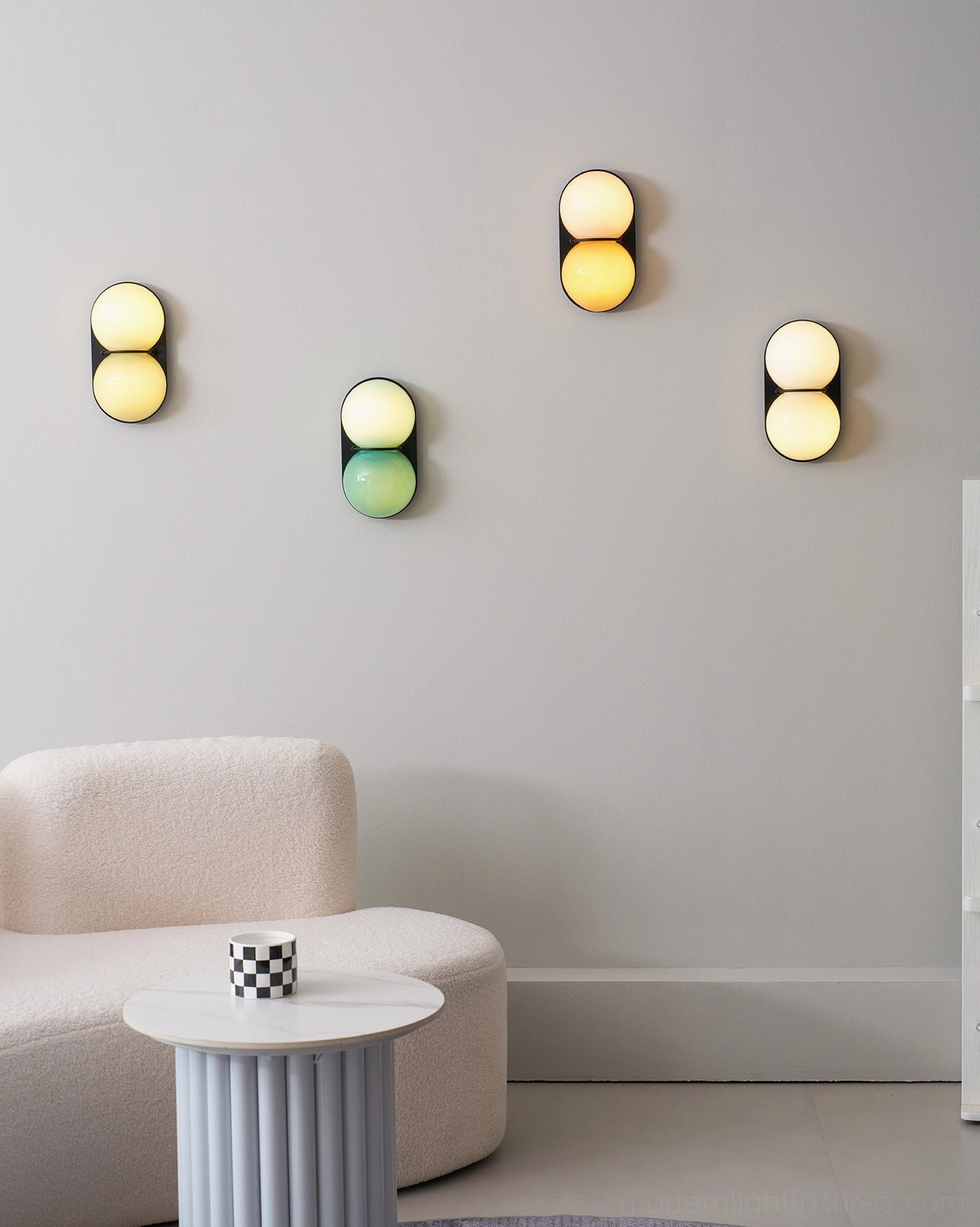 Twinwave double glass orb wall sconce modern fixture in luxury interior home setting