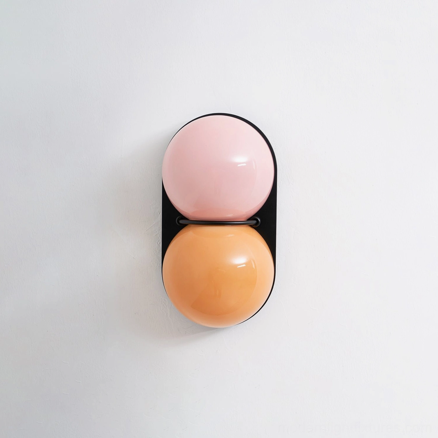 Twinwave double sphere wall light with serene sculptural design and ambient glass glow