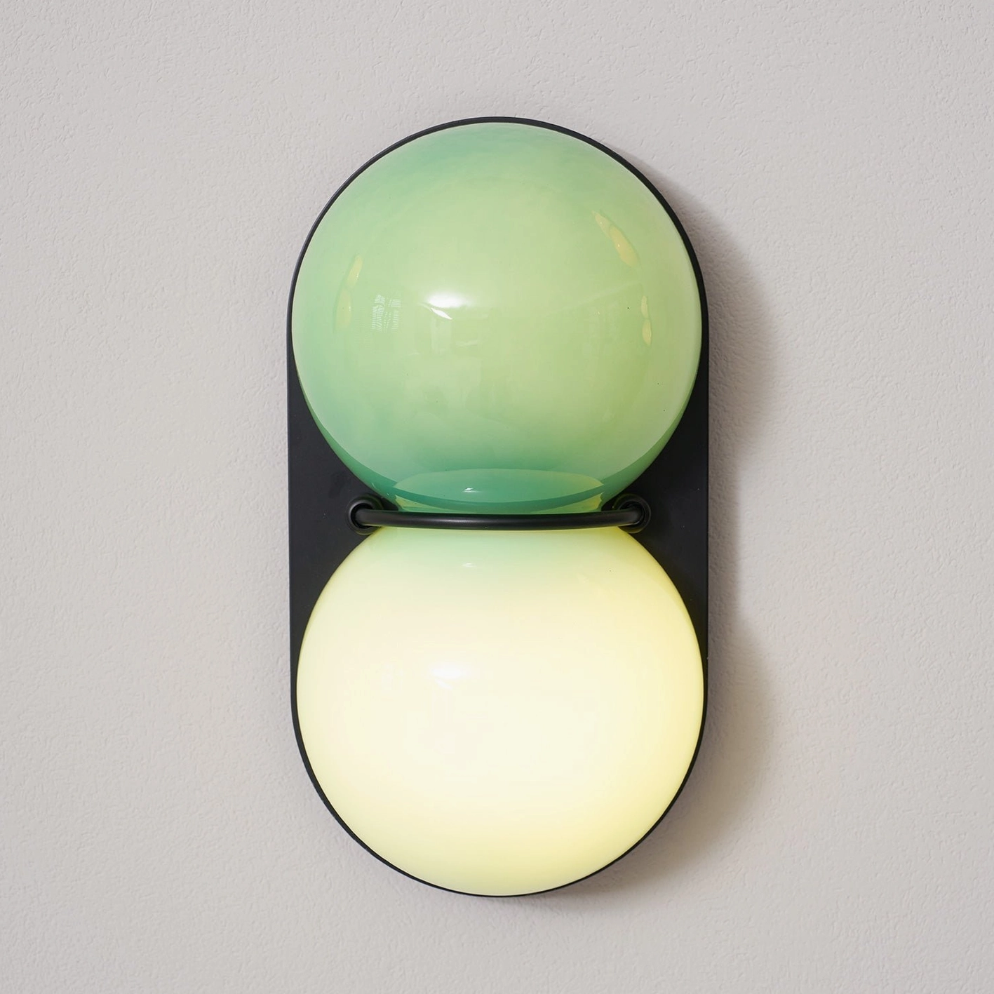 Twinwave modern wall light double globe sconce in contemporary Japandi interior design
