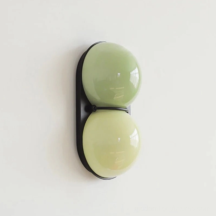 Twinwave wall sconce black mint green light green glass variant modern interior design
