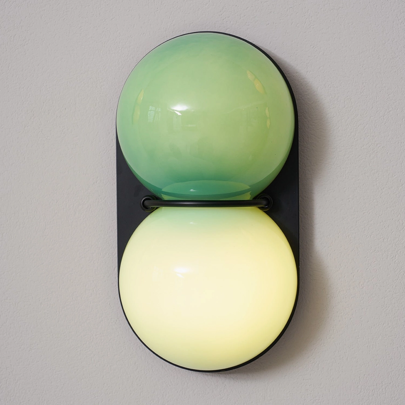Twinwave wall sconce contemporary double sphere glass fixture in luxury modern home