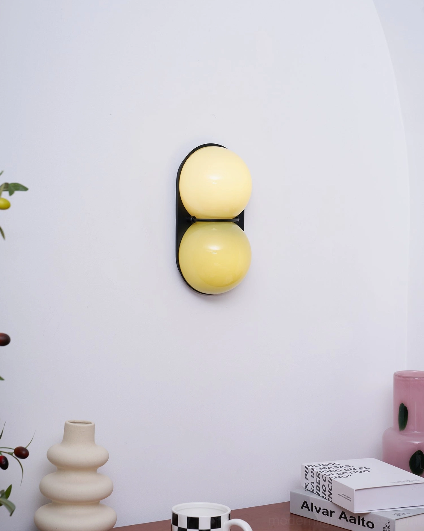 Twinwave wall sconce elegant design installed in luxury modern interior space with ambient warmth