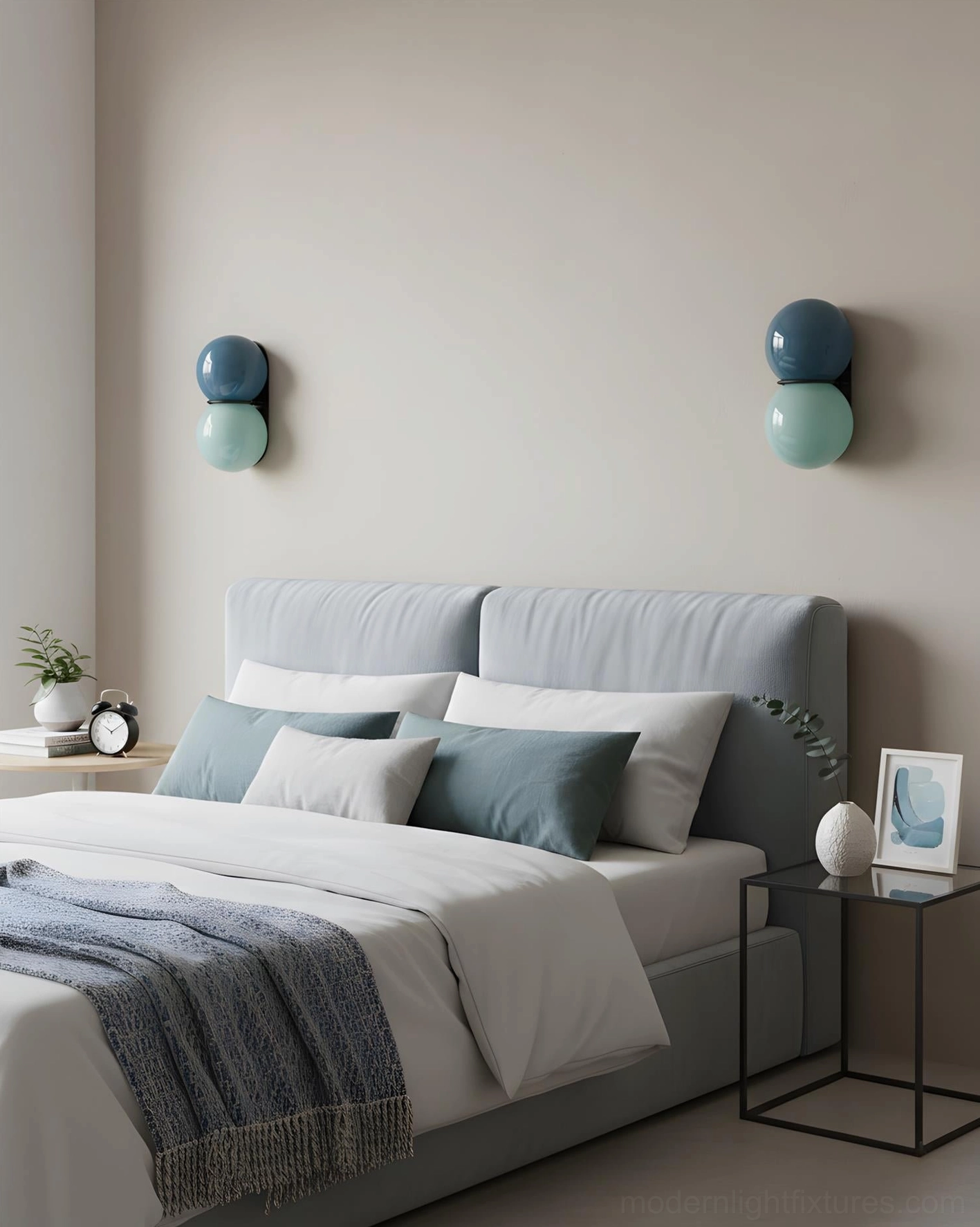 Twin Twinwave double globe wall sconces installed in modern Nordic bedroom beside bed with neutral decor