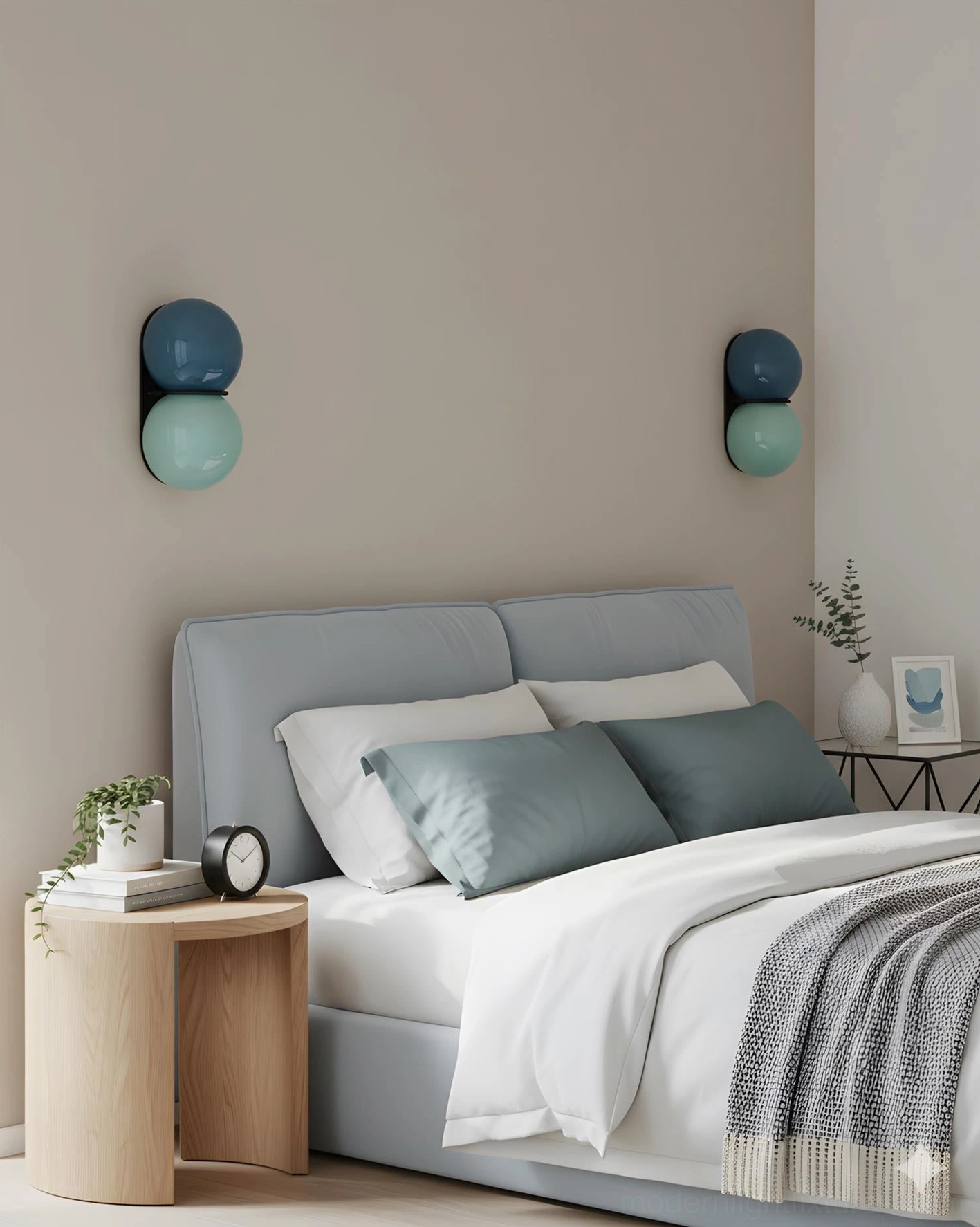 Twin Twinwave double glass orb wall sconces beside bedroom bed with soft cool-toned Nordic lighting