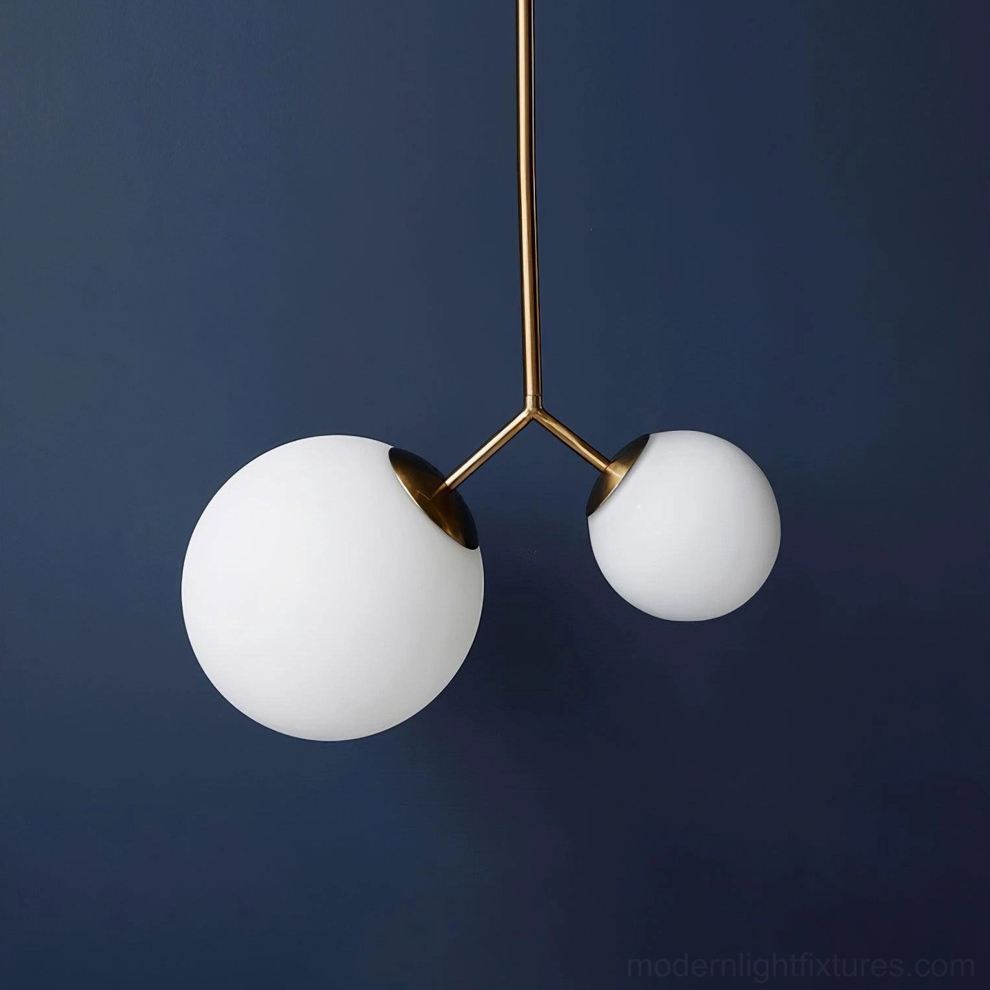 Twis contemporary pendant fixture with black metal hardware and asymmetrical frosted glass globes direct front angle