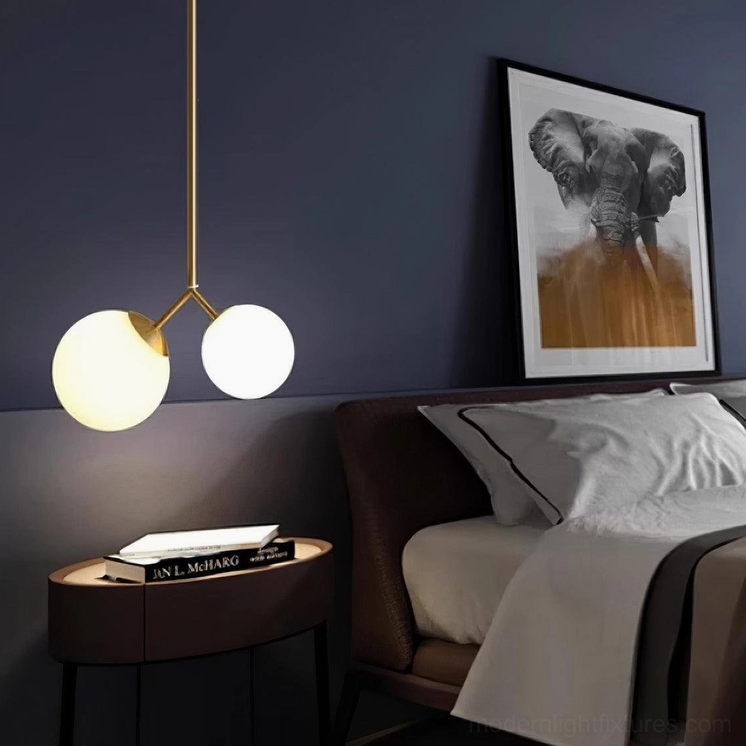 Twis modern dual-head glass globe pendant fixture with metal frame and frosted glass shades architectural detail