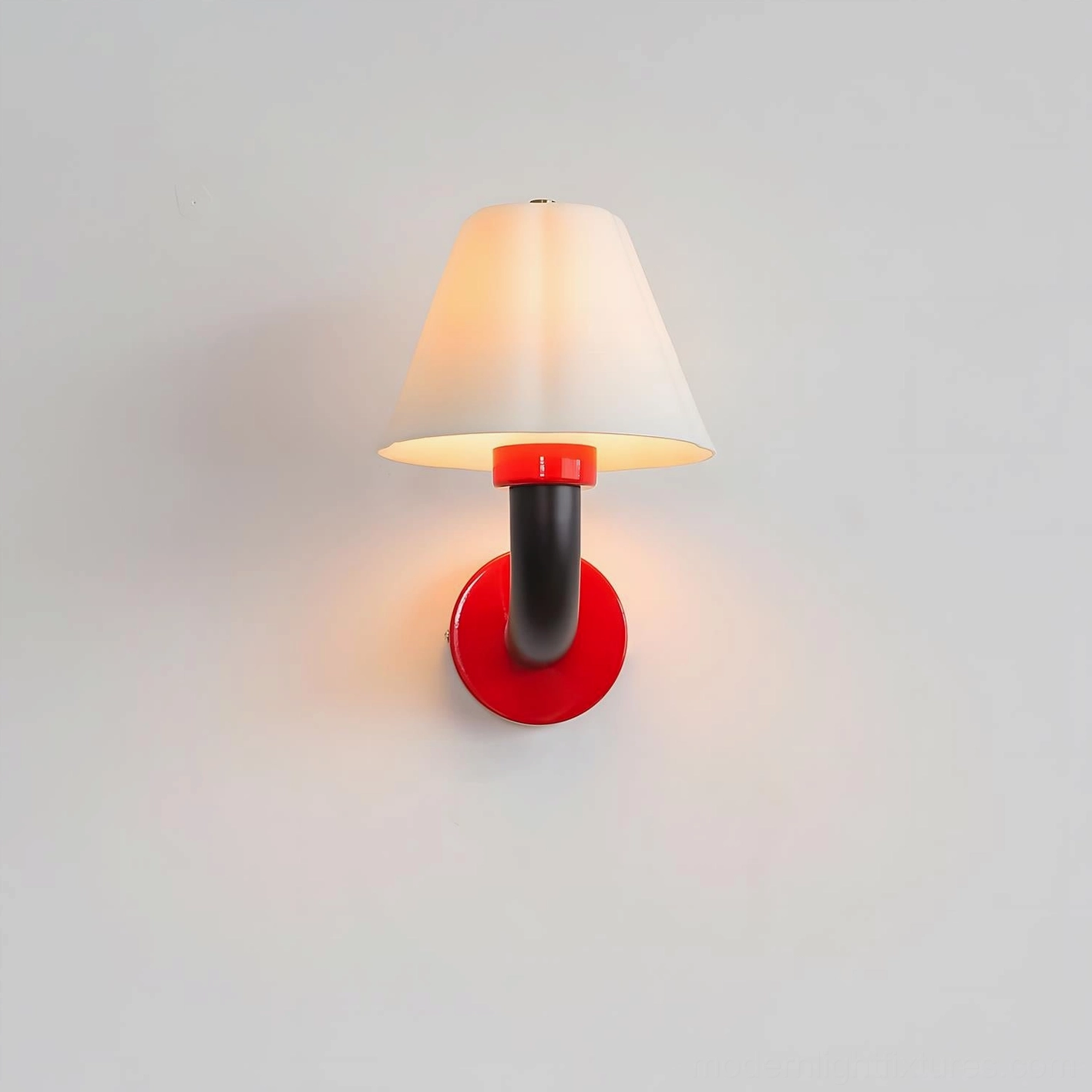 Illuminated Twist Shine wall sconce showing warm light glow from white conical fabric shade against gray background