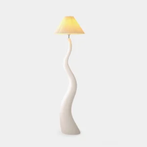 Twisted resin floor lamp with pleated fabric shade in matte white finish, front studio view