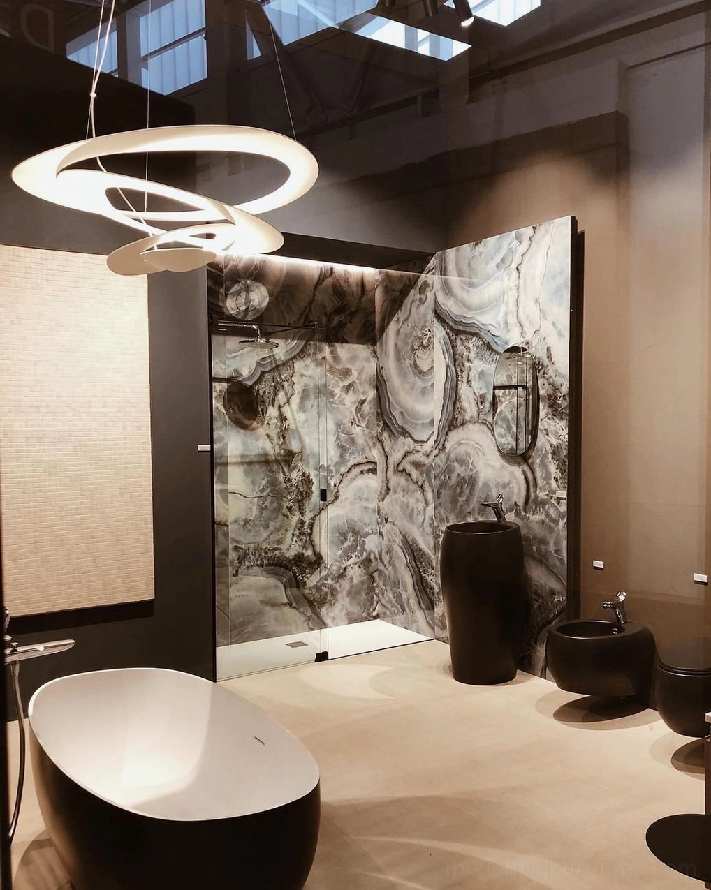 Twisted ring LED chandelier in art deco inspired interior, contemporary twist on classic elegance