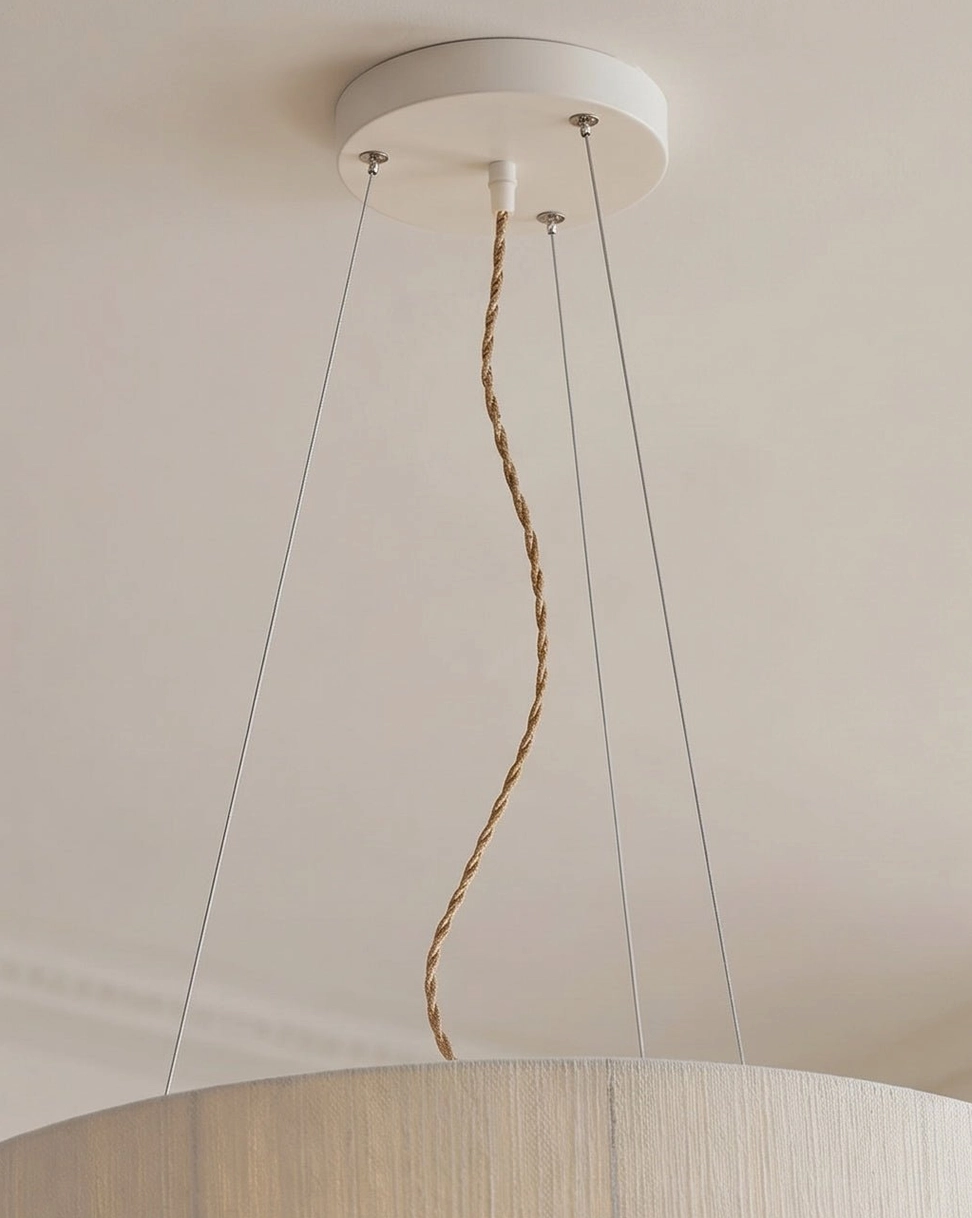 Two-tier cotton drum pendant light side profile showing stacked cream drum design with white iron frame and adjustable suspension wires