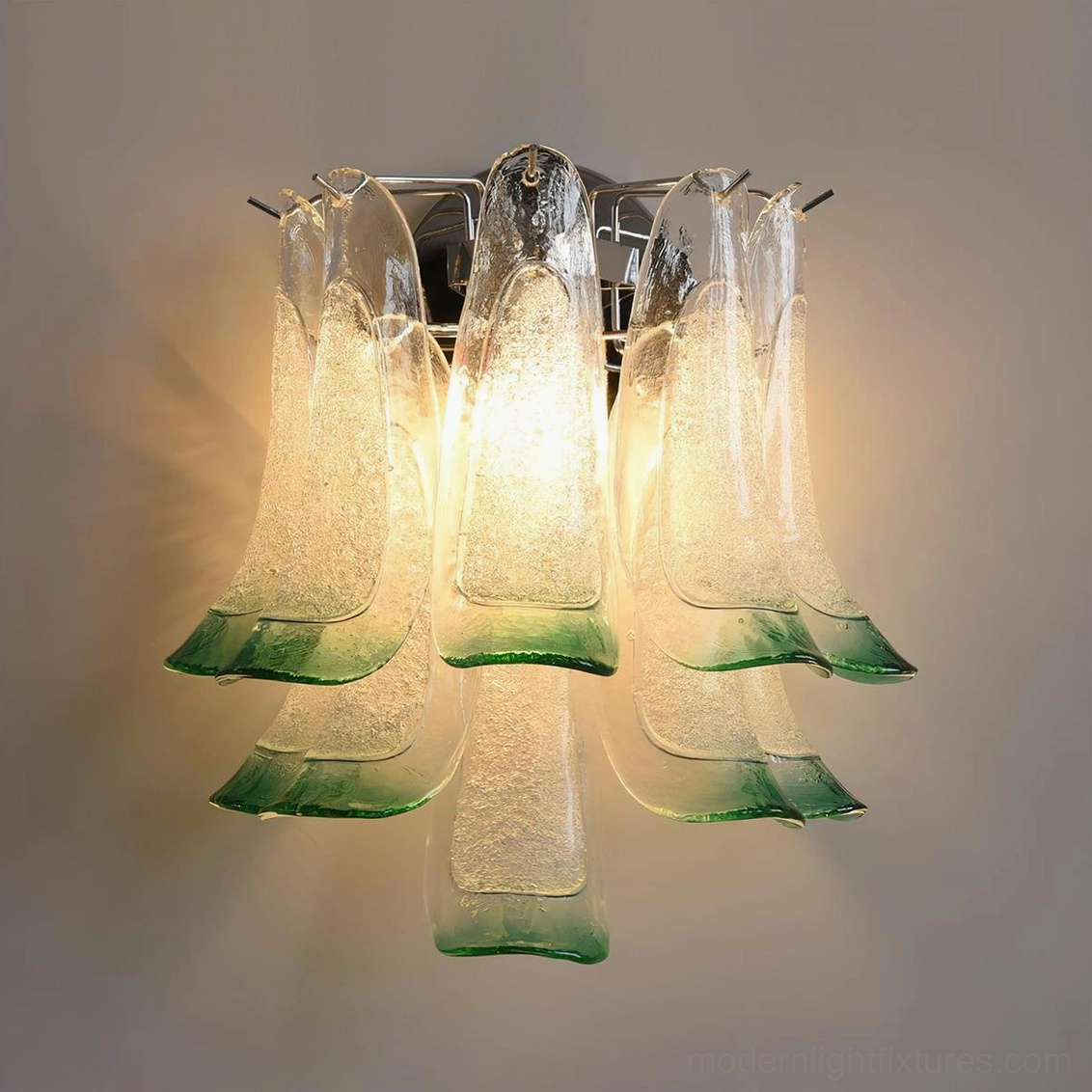 Two-tone clear green petal wall sconce, textured bubble glass with chrome mounting, high front angle studio view