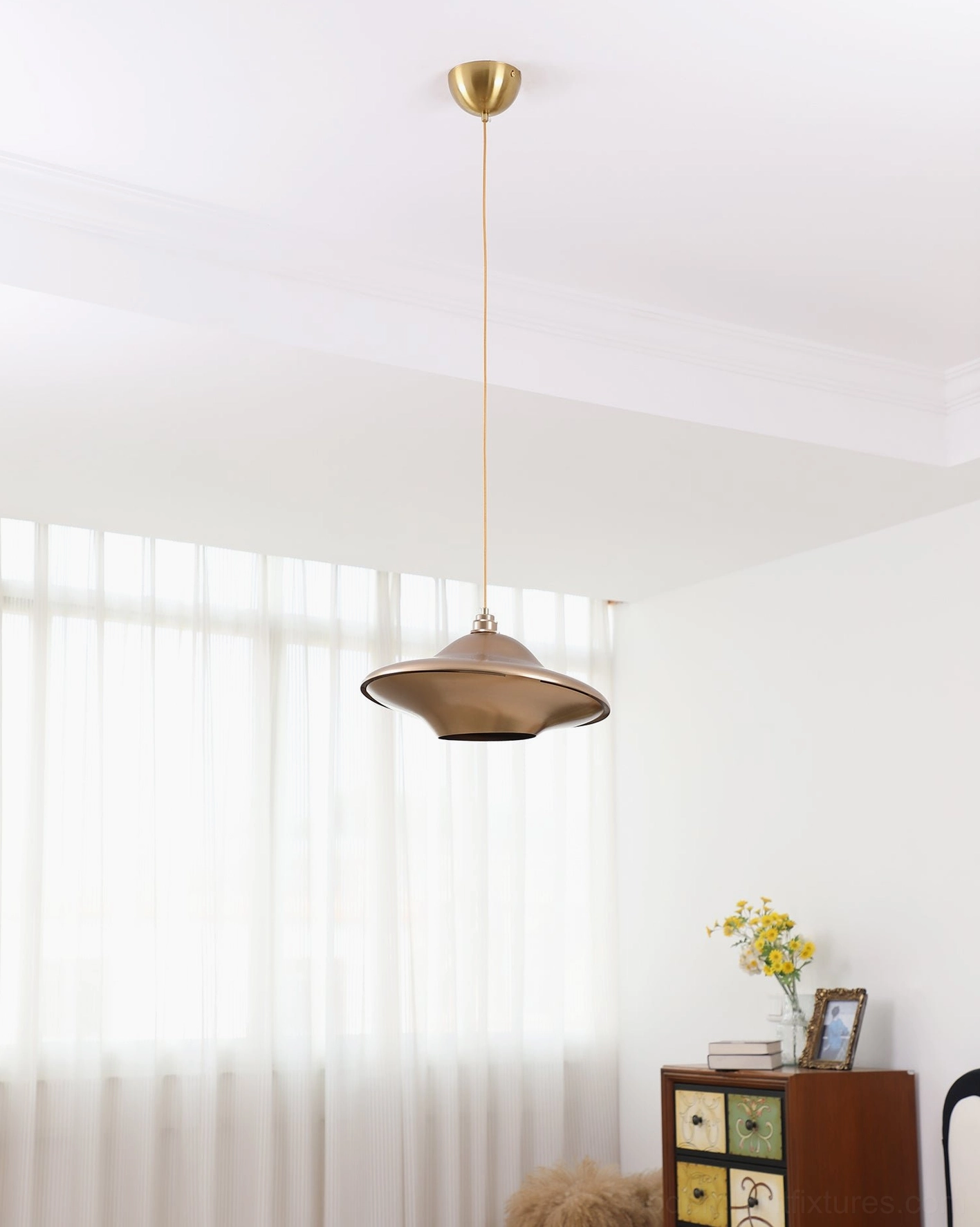 UFO pendant light rose gold finish - warm metallic ceiling lamp in bright minimalist living space