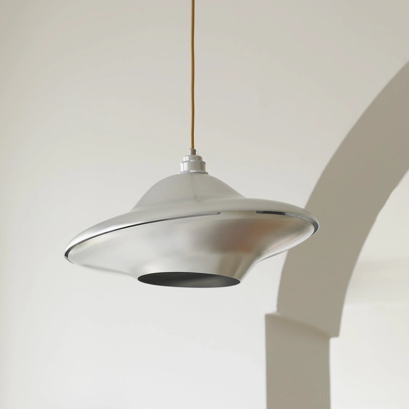 UFO pendant light side profile - sleek saucer-shaped modern lighting fixture with smooth curved edges