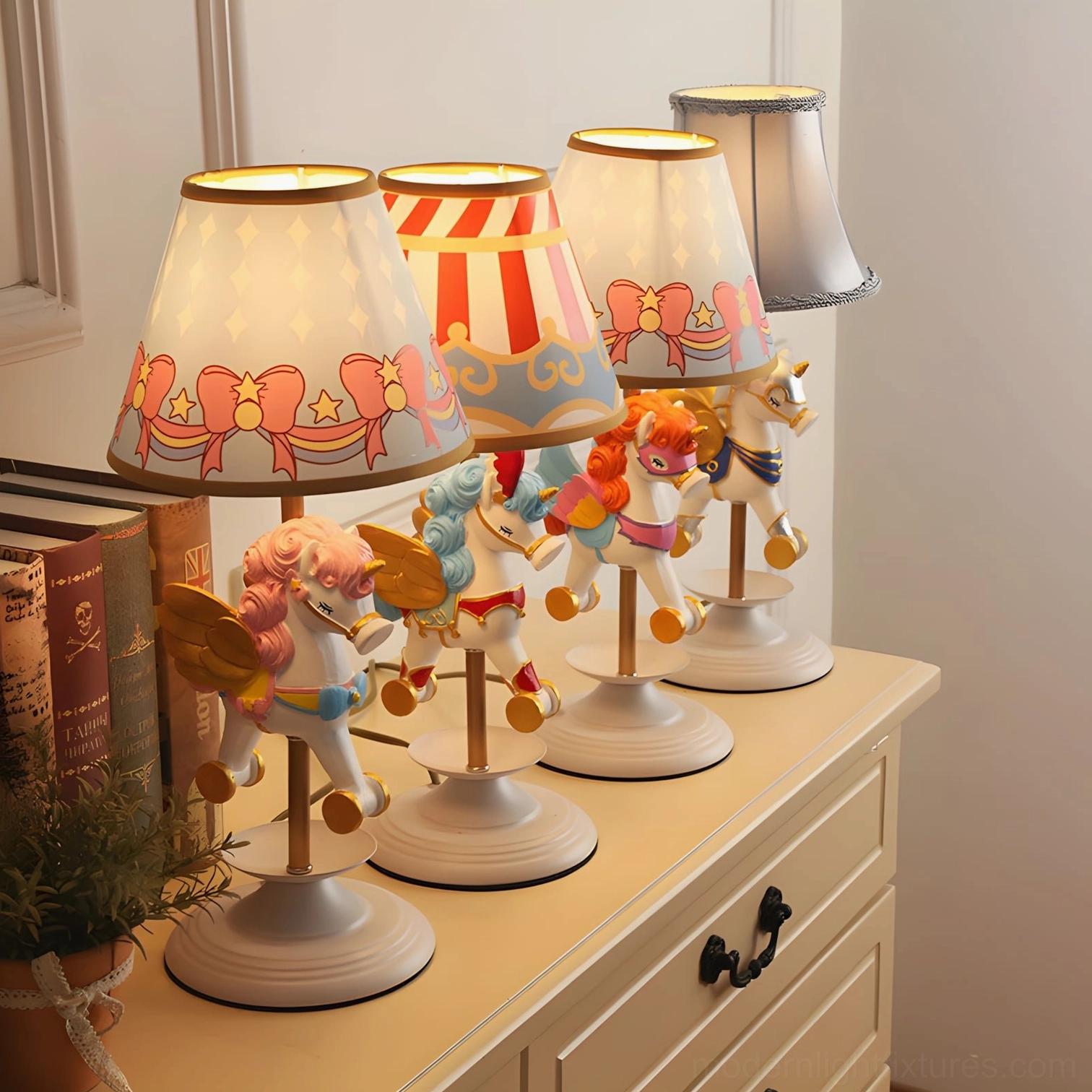 Pink model unicorn table lamp with carousel-inspired winged details and pastel ribbon design
