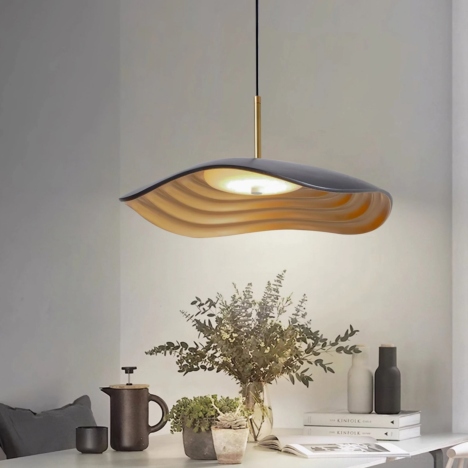 Valentina wavy pendant light in black finish with integrated LED technology and grooved interior texture