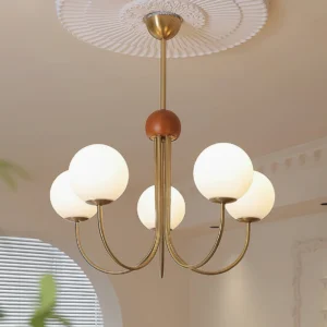 Valentina modern chandelier installed on decorative ceiling medallion in residential living room with warm ambient lighting