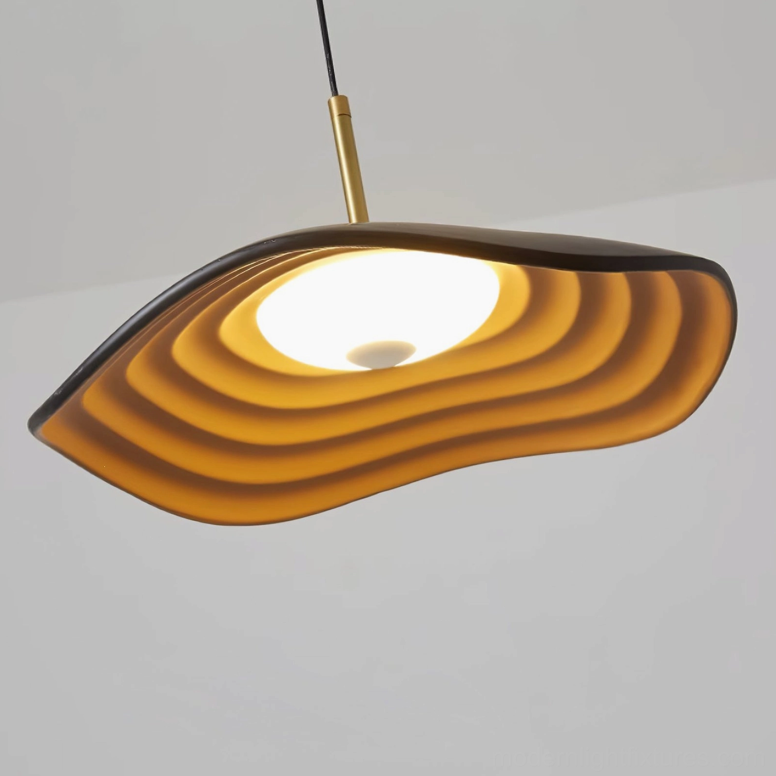 Valentina modern pendant light fixture display showing curved shade form and architectural silhouette