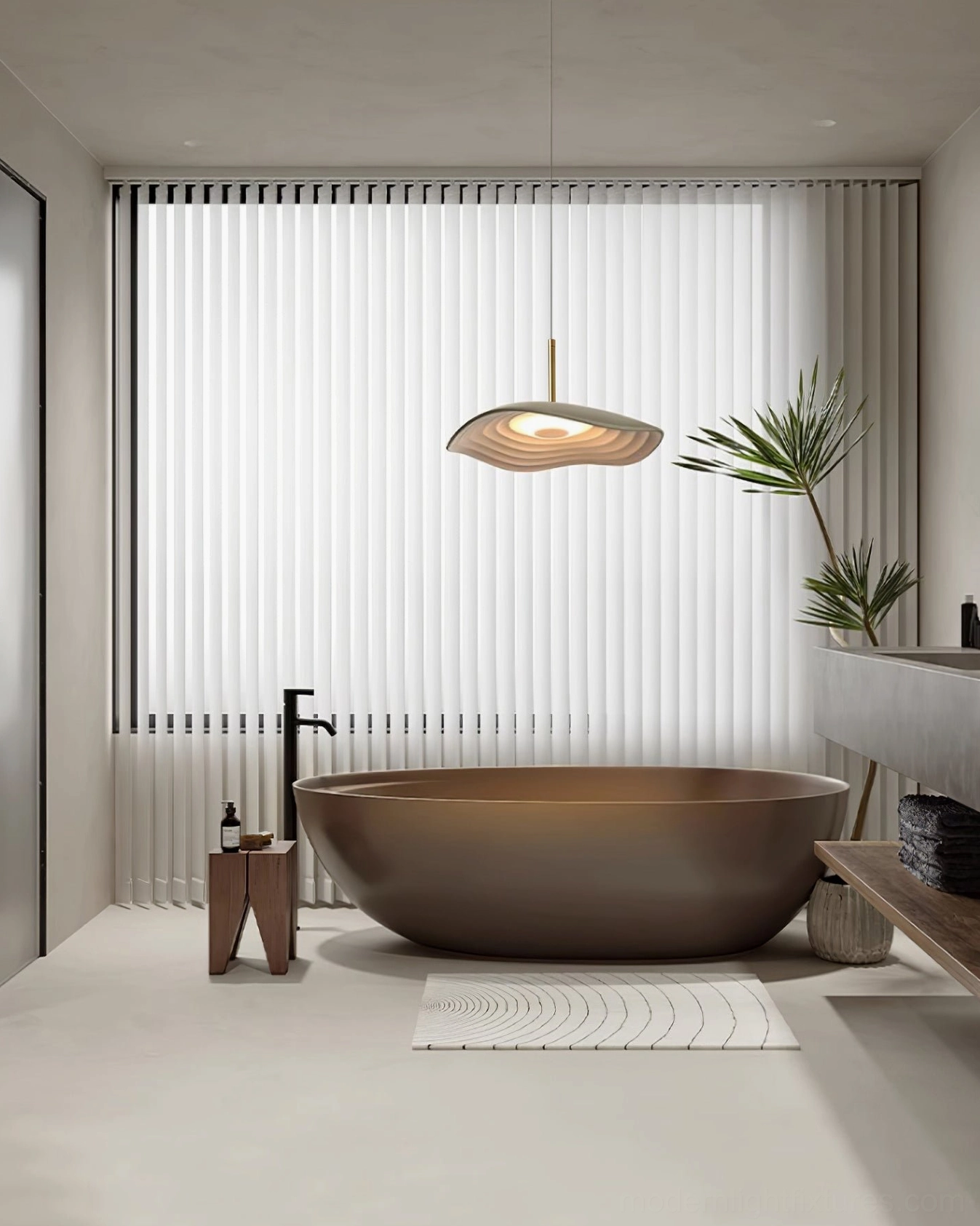 Single Valentina wavy pendant light with warm-toned resin shade suspended in modern minimalist bathroom