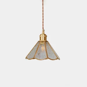 Valeria scalloped glass pendant light with brass frame and embossed clear glass shade, front view studio shot