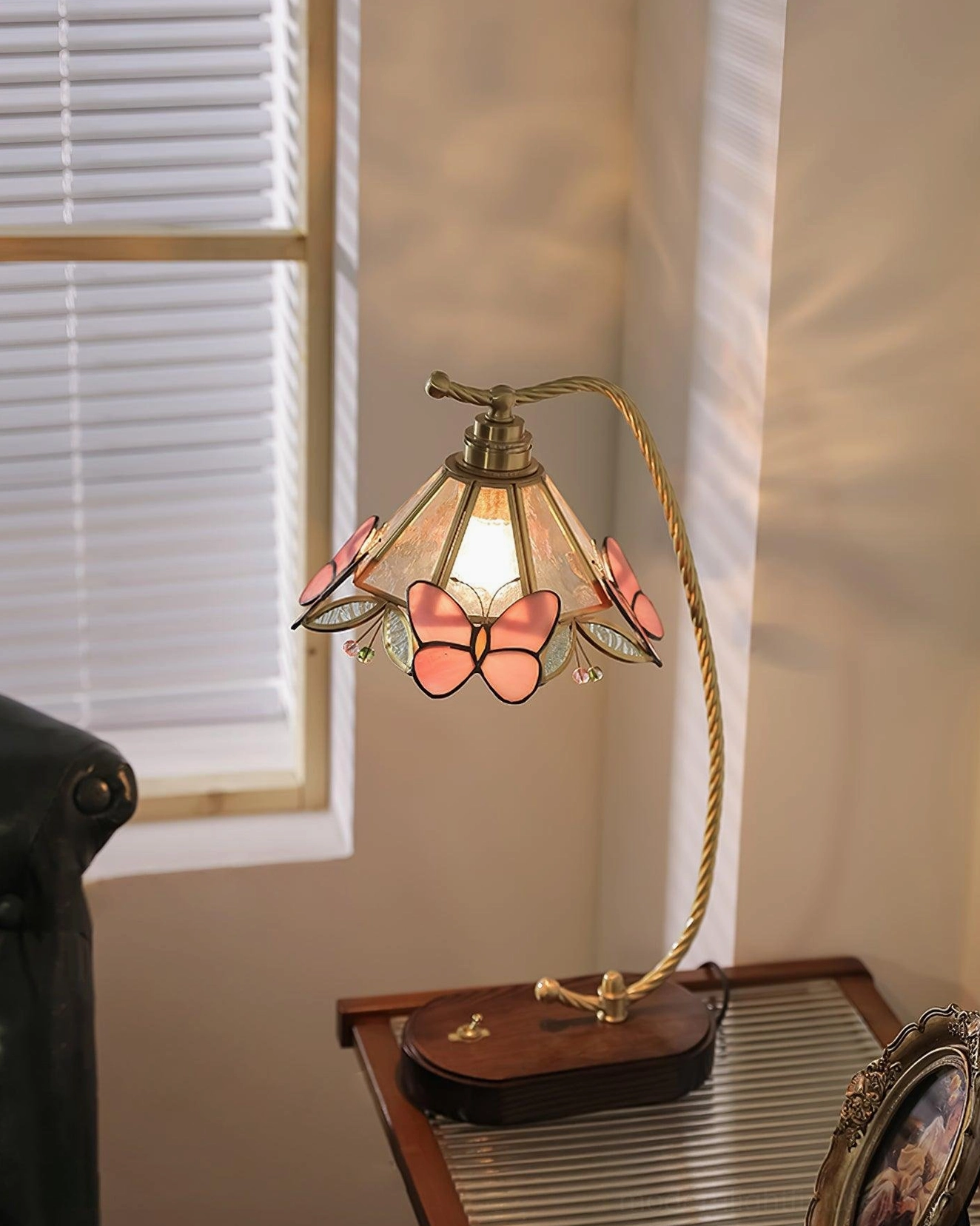 Valerie Butterfly vintage table lamp walnut wood base detail with brass connectors and decorative elements, close-up view