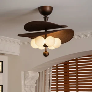 Valmorra layered fabric ceiling lamp installed in luxury bedroom with crown moulding, dark brown shades, warm globe bulb cluster, low angled view