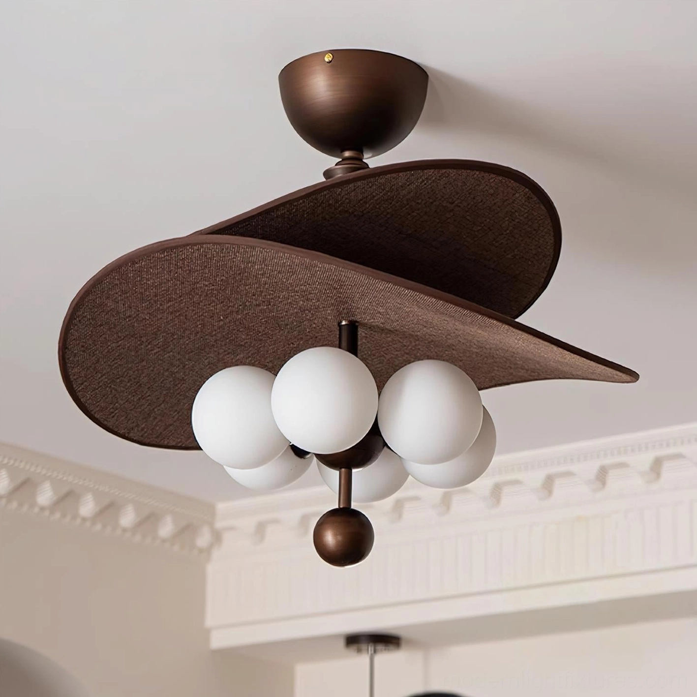 Valmorra layered fabric semi-flush ceiling light with two-tier brown leaf-style shades, white frosted globe bulbs, bronze finial, white wall installation