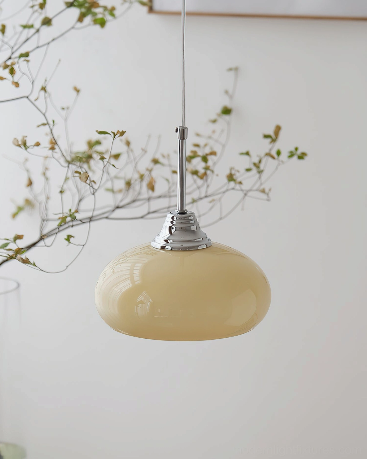 Vanilla pendant light side view showcasing beige glossy glass dome and chrome hardware