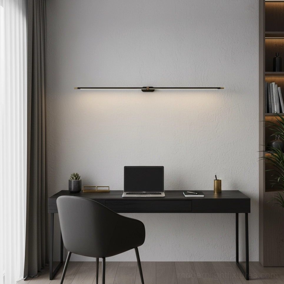 Linear wall sconce installation above vanity creating symmetrical balanced bathroom lighting design