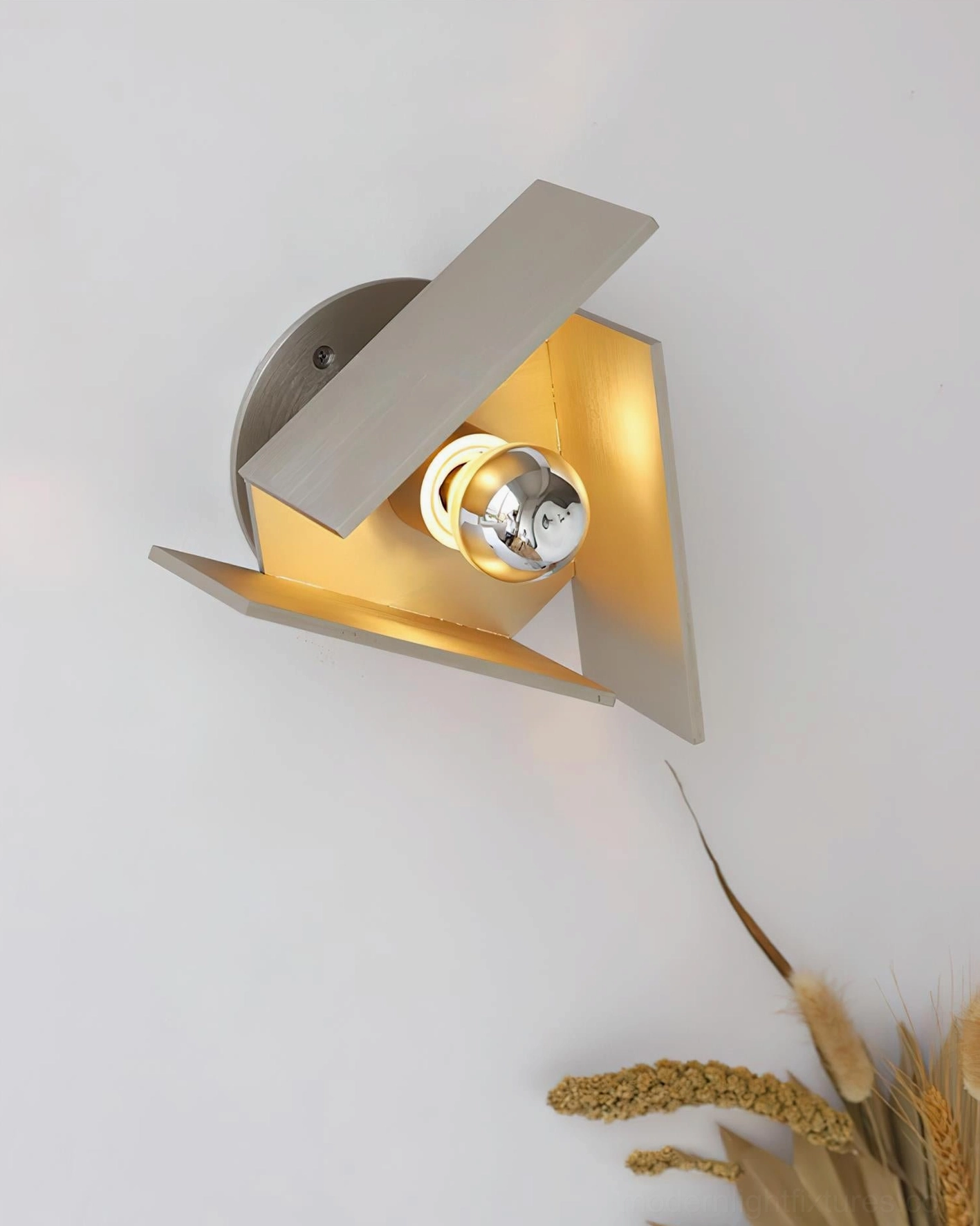 Vanta geometric wall sconce left side view chrome socket detail with taupe and gold color palette