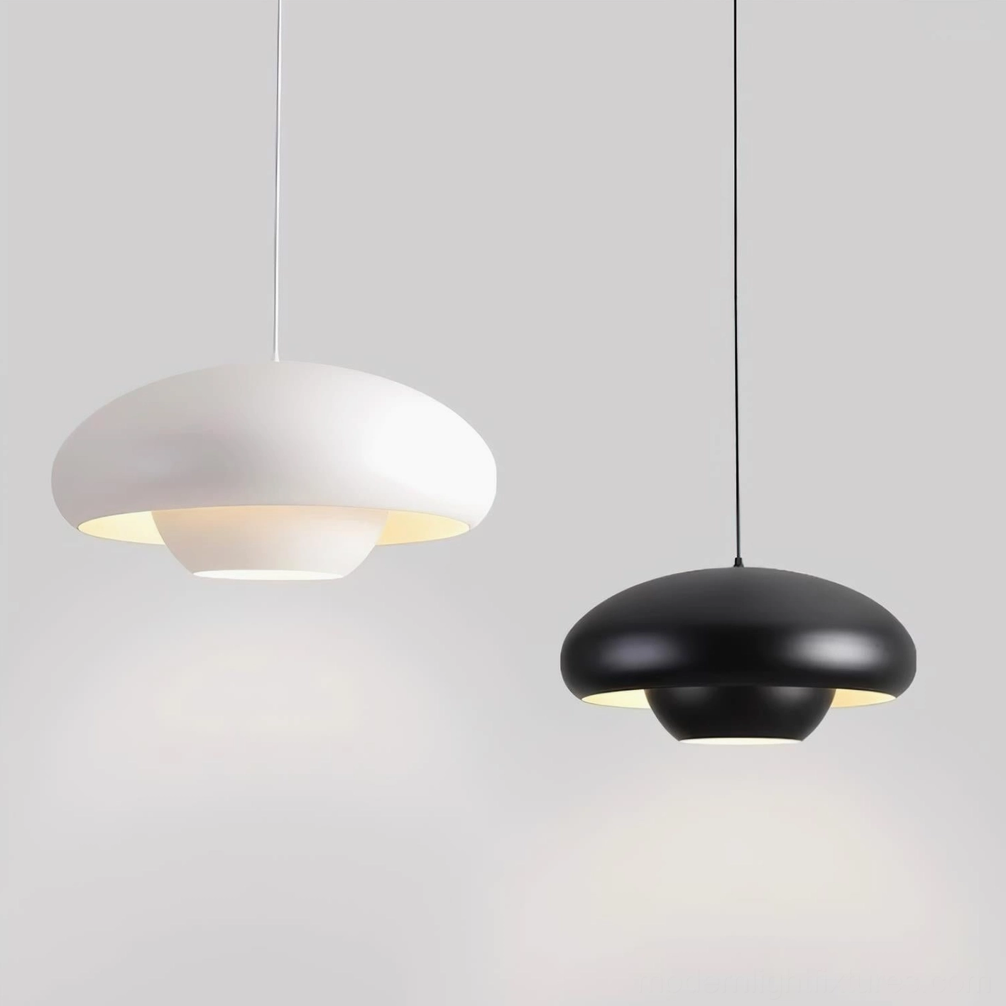 Black and white Vario dome pendant lights, studio flat view showing matte metal finish and minimalist silhouette