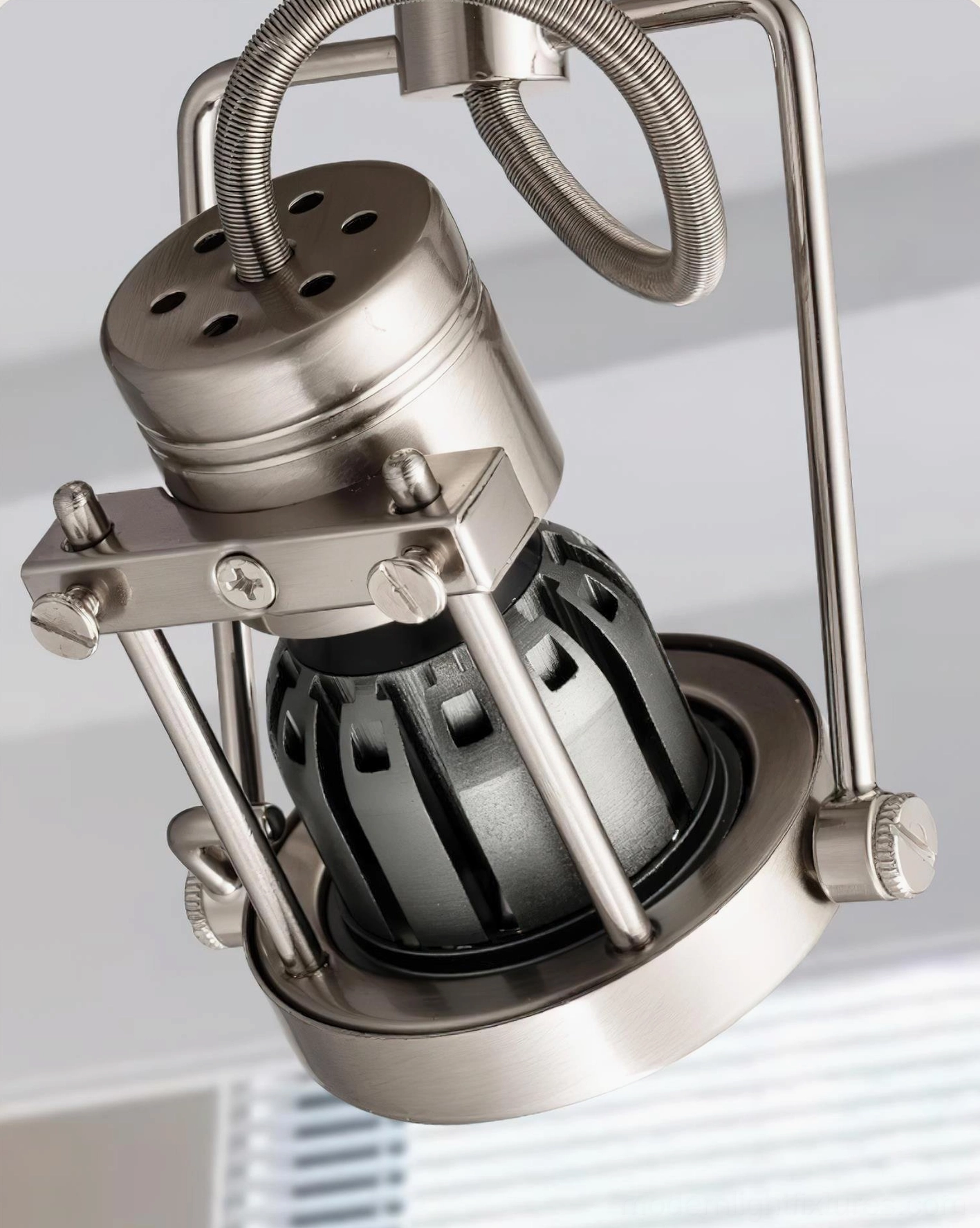 Industrial design track lighting system with exposed hardware and geometric frame structure
