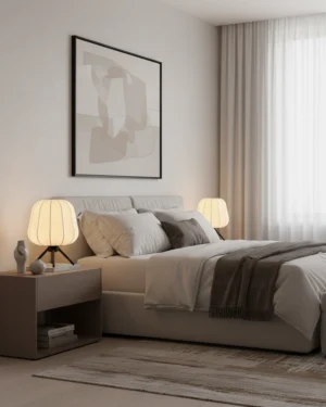 Pair of Veilo minimalist tripod table lamps on wooden nightstands in contemporary bedroom setting