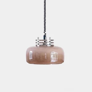 Vela pendant light with taupe brown translucent glass drum shade and polished chrome top fixture, front studio view