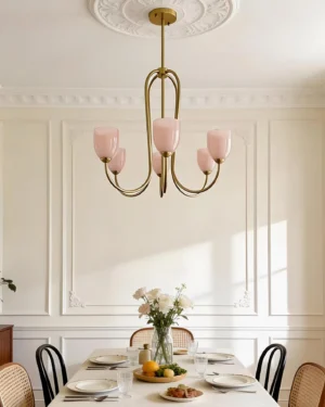 Velin 6-head chandelier in formal French dining room with warm neutral interior styling and elegant table setting