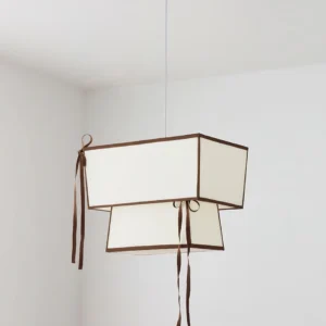 Cream beige Velina fabric pendant lamp in minimalist white room interior design