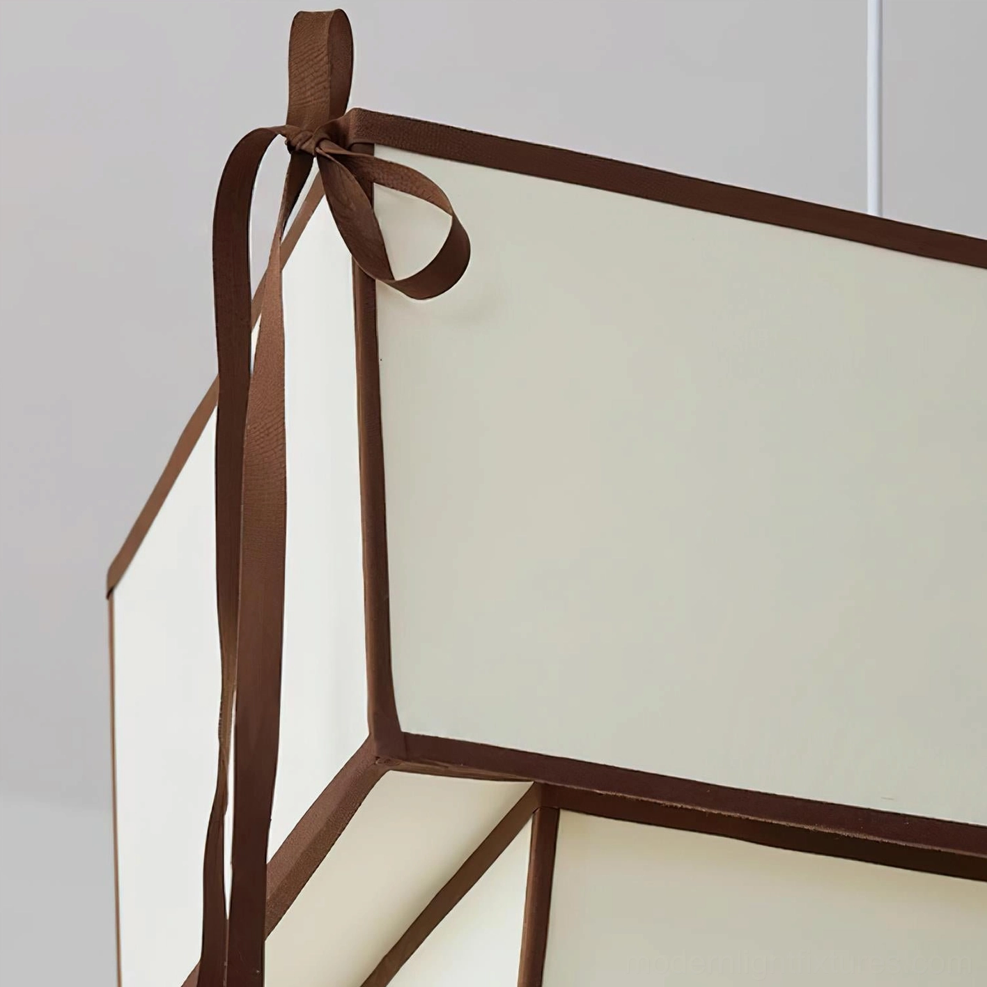 Velina fabric pendant light showing two-tier layered design and cascading ribbon details