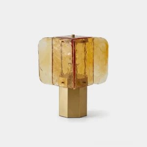 Veloura amber glass cube table lamp with brushed gold hexagonal steel base - front studio view