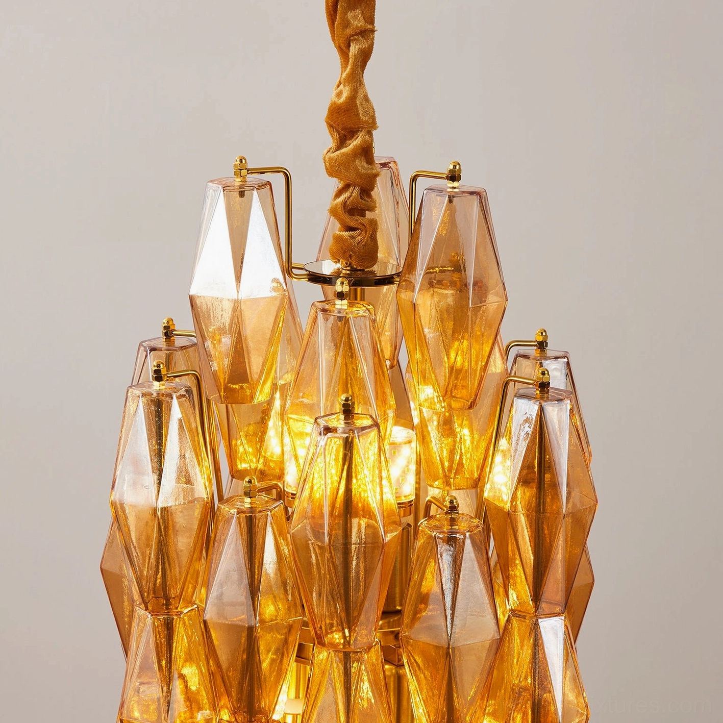 Velthra faceted glass pendant light showing geometric precision and hand-blown craftsmanship