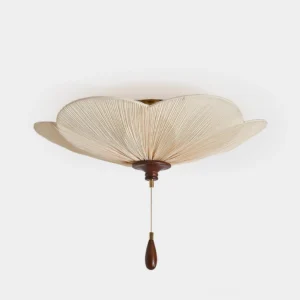 Velvet Leaf pleated petal-shaped ceiling light fixture with beige fabric shade and walnut wood base, front studio view