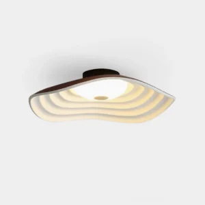 Veneria wavy LED flush mount ceiling light with brown trim and layered matte diffuser in overhead studio view