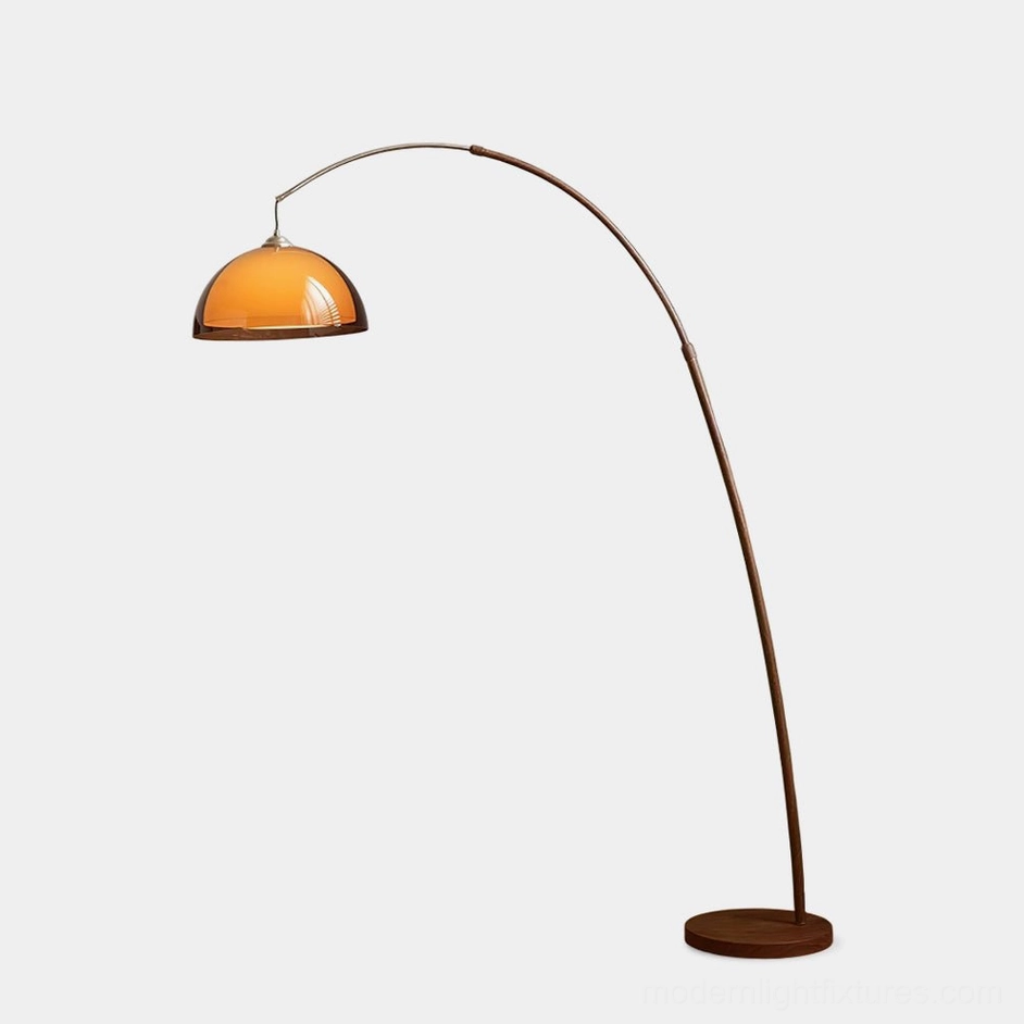 Ventoro arc floor lamp with walnut metal frame and amber dome shade, front view on white background, modern mid-century design
