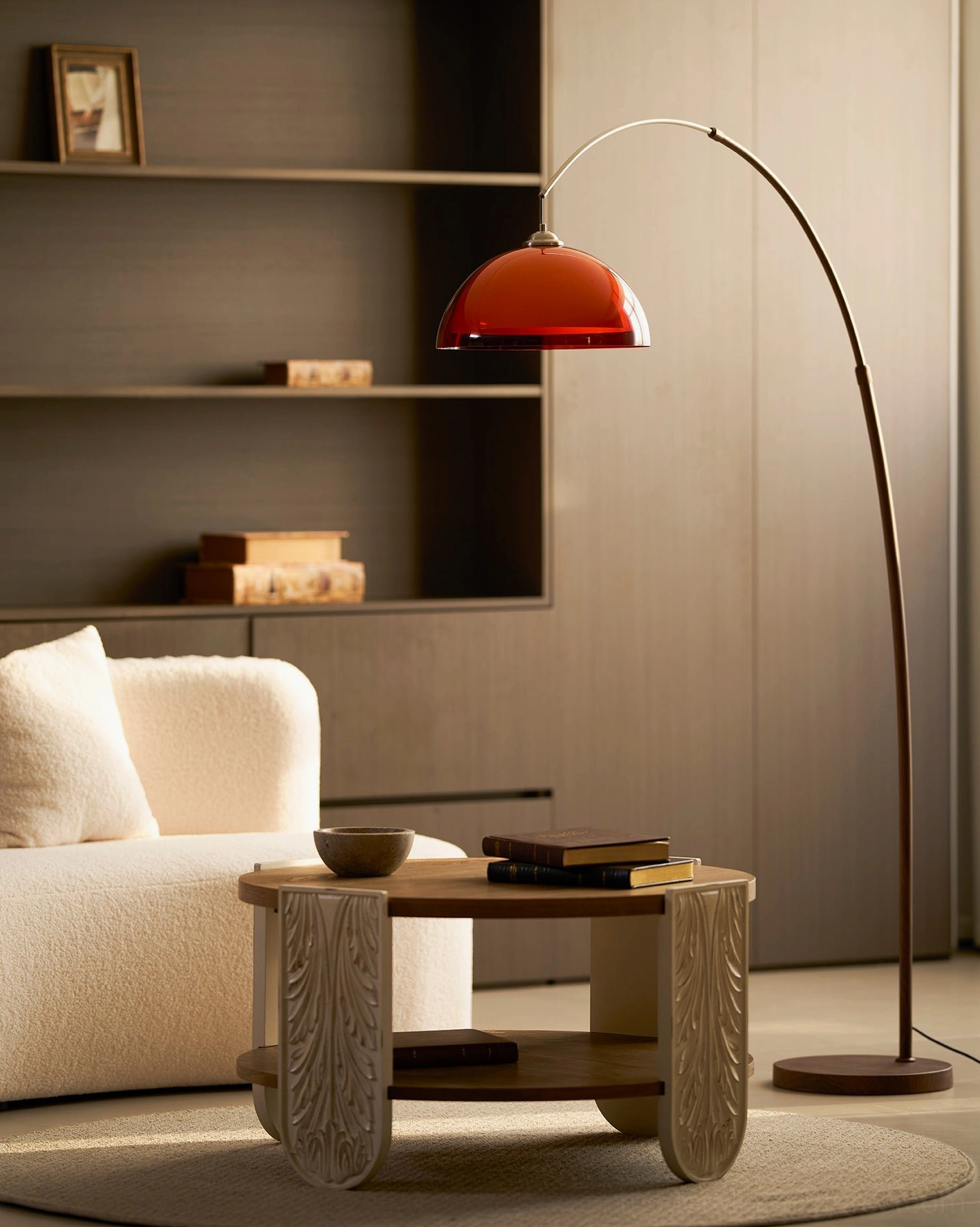 Ventoro arc floor lamp sculptural form in natural daylight showing frame silhouette and dome shade design