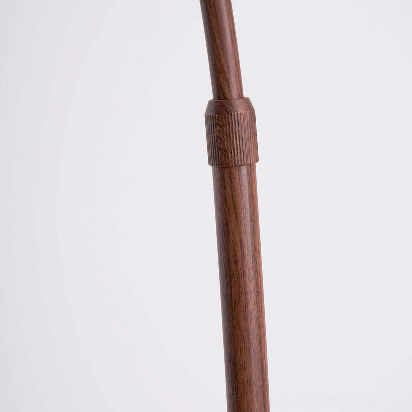 Ventoro arc floor lamp in transitional interior blending modern and traditional design elements seamlessly