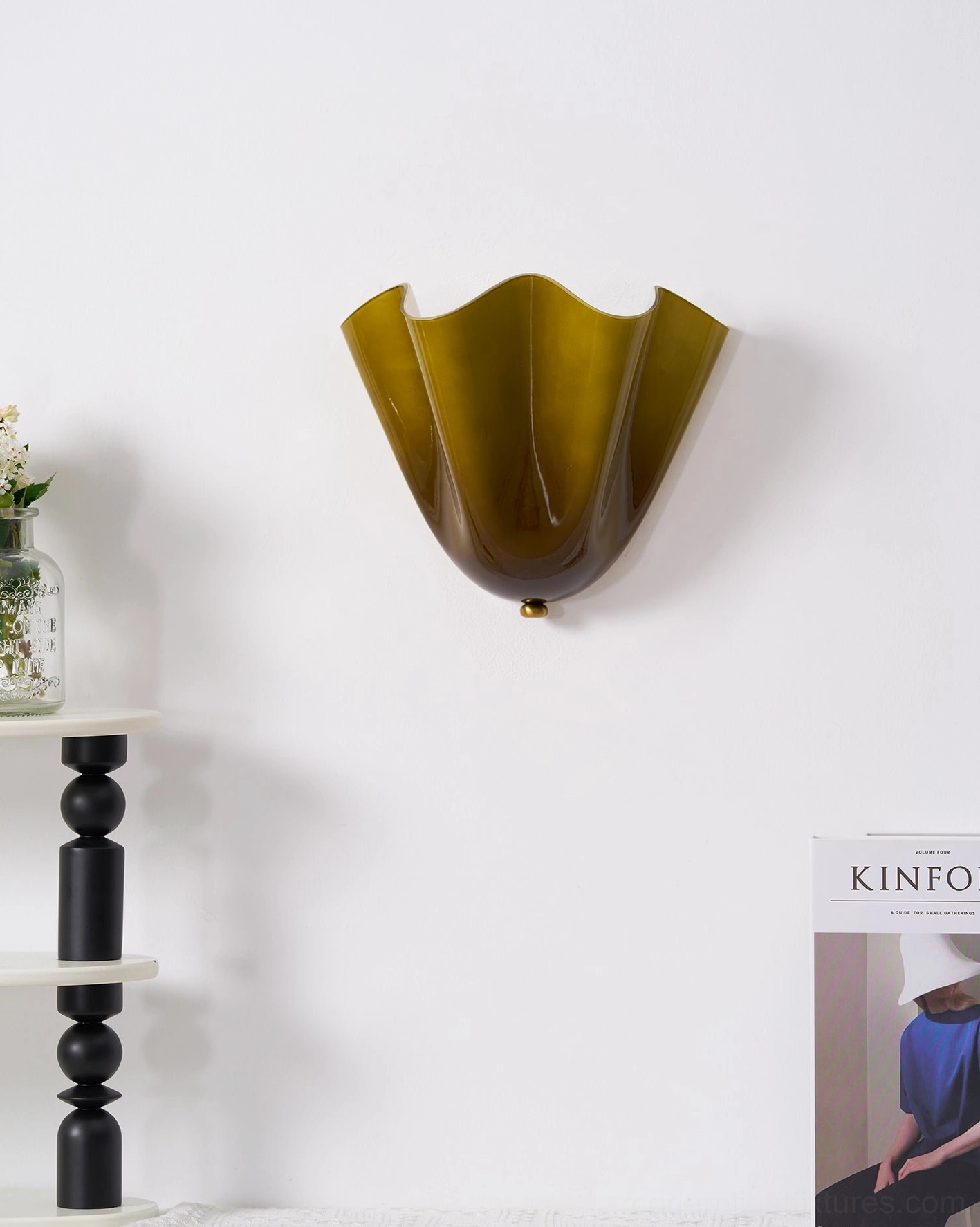 Vera beige white glass wall sconce showing neutral warm light diffusion through translucent shade